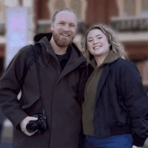 Anthony and Kayla, hosts of Yamadasan Ski Lodge for the 2026 season, smiling together at Disneyland Tokyo.