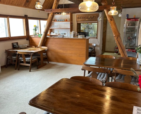 Dining room and bar area where breakfast is served at Yamadasan Ski Lodge